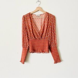 NICHOLAS SIZE 2 Persimmon 100% silk long sleeve smocked top in Marrakesh print